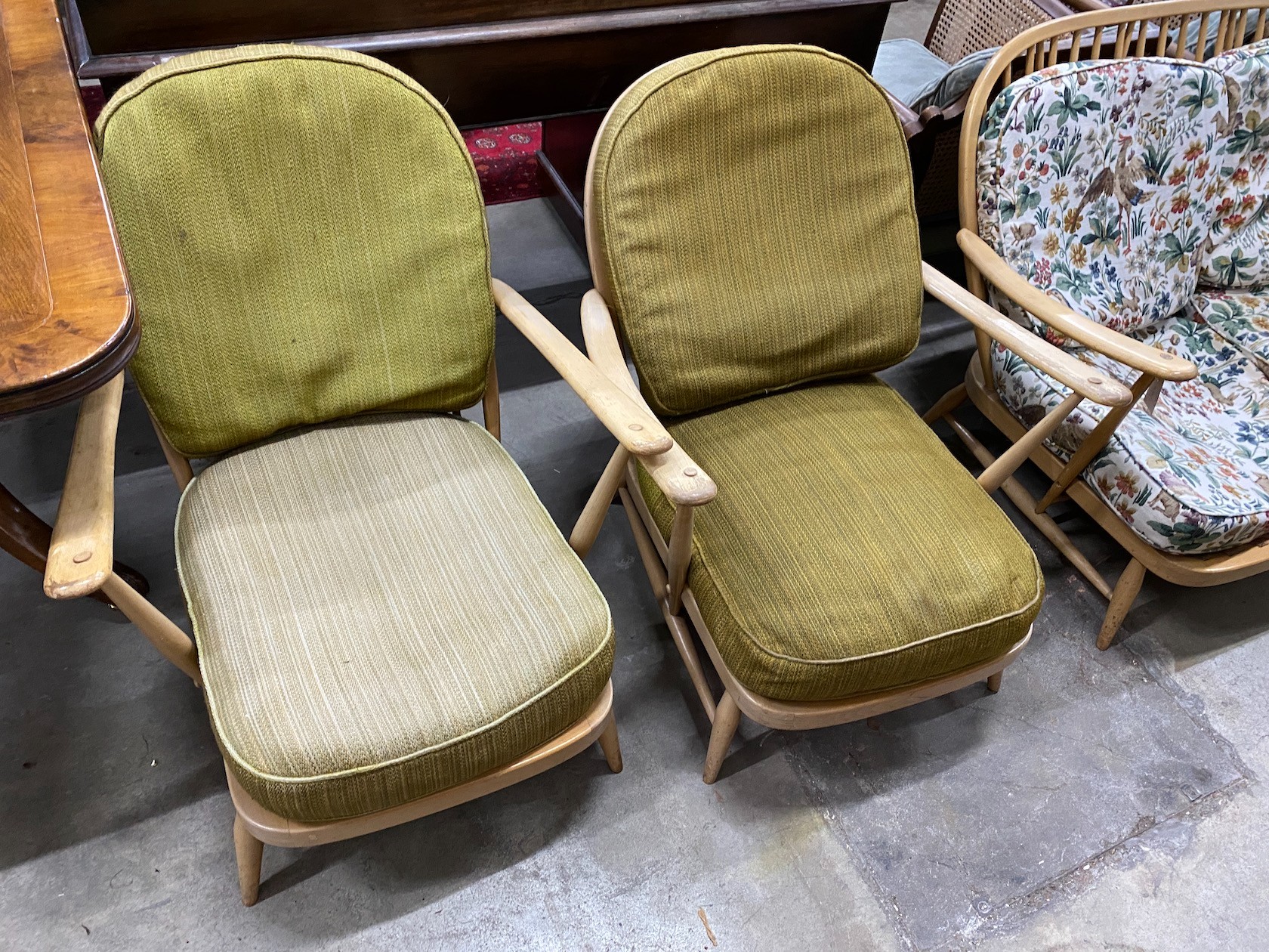 An Ercol light beech three piece lounge suite, settee length 134cm, width 75cm, height 75cm